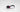 Black and White Satisfyer penguin air pusle vibrator for women lying on its side