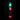 Clear vibrating dildo with green and red lights on a black background