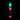 Clear vibrating dildo with green and red lights on a black background