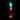 Clear vibrating dildo with green and red lights on a black background