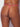 Woman wearing a pink lace thong back view