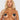 Woman wearing black adhesive pads on her chest against a white background