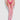 Person wearing pink lingerie and stockings on a light gray background