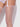 White sheer stockings worn by a person on a white background