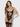 Model wearing a black lace lingerie set on a plain background