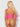 Person wearing a pink bikini with pom-pom details on a plain background