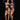 Two women in matching blue and gold costumes posing against a black background