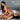 Woman in red lingerie sitting on a man on a bed with 'Ride 'em Cowgirl' text and Bedroom Bliss branding.