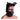 Man wearing a black leather dog muzzle and head harness on a white background
