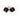 Black wrist cuffs on a white background