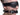 Black leather Padded Blindfold and Gag Set on a person's head with a white background