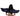 Black angel wings worn by a person on a white background