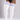 White ribbed thigh-high socks with pink and blue stripes at the top, worn by a model in a black bodysuit against a gray studio background.
