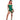 Woman wearing a green costume with leaf details on a white background
