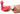 Pink and white clitoral stimulator held by a person on a white background
