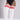 White ribbed thigh-high socks with three red stripes near the top, worn by a model in a black bodysuit against a light gray studio background.