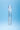 Clear glass dildo with wavy design on a blue background