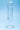 Clear glass dildo on a blue background