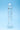 Clarity Seraphic Serenade Glass Dildo with wavy texture on a blue background