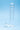 Clear glass dildo on a blue background