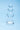 Clear glass anal plug on a light blue background
