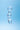 Clarity Utopian Mystique Glass Dildo on a blue background