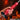 Hand holding a red Hell Hound Squirting Silicone Dildo with flames and smoke in the background, featuring 'Creature Cocks' branding.