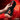 Hand holding JOCK Advanced Banger Sucking & Vibrating Pussy Masturbator against a red background with flames.