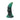 Green and black textured dildo on a white background