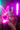 Woman in a black and pink Playboy lingerie with neon lights in the background