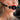 Close-up of a person wearing a black ring gag with 'Master Series' branding.