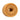 Beige textured donut-shaped stroker on a white background