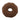 Chocolate donut-shaped masturbator on a white background