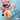 masturbator with a stylized depiction of a person in a school uniform and a large cylindrical object on a blue polka dot background.
