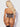 Person wearing a leopard print thong and black stockings on a plain background