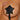 Black star-shaped adhesive patch on a person's chest