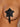 Black star-shaped adhesive patch on a person's chest
