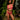 Woman in a pink lingerie standing in a lush green outdoor setting