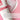 Vaginal moisturizer tube with cream on a pink background