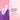 Pink rabbit vibrator on a pink and purple geometric background with text about speed and vibration patterns.