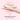 Pink Le Wand Mini Vibe G-Double G-Spot Vibrator held in a hand with 'IPX6 Splash-Proof' text on a pink background