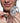 Person holding Lockdown Customizable Chastity Cage and a key