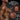 Advertisement for Master Series Perky Pair G Cup Silicone Breasts Dark with a focus on crop top style and realistic details, featuring a man's torso.