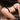 Person wearing a black Master Series Roped Anal Hook with Rope with a 'Collar Not Included' label, featuring the Master Series logo.