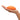 Orange We-Vibe Temp Lay-On Vibrator held in a hand on a white background