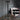 Master Series Pillory CBT Tower with measurements on a wooden surface, blurred background