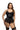 Woman wearing a black lace lingerie set on a white background
