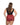 Woman wearing a black tank top and red shorts with heart pattern on a white background
