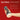 Hand holding a 'Ultra Stroker' masturbator with features listed on a red background