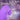 Purple clitoral stimulator with text on a dark background